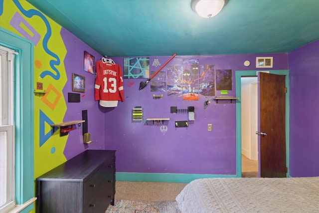 bedroom featuring visible vents and carpet