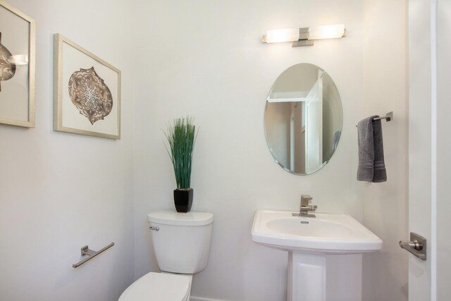 631 Fairview Ave NE Unit 3, Grand Rapids, MI 49503 - bathroom with toilet and a sink