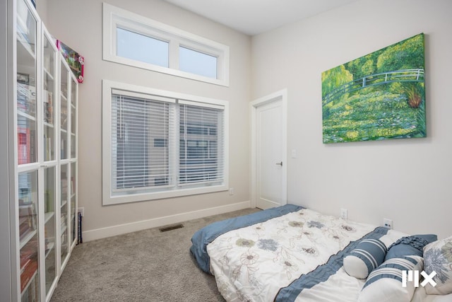 631 Fairview Ave NE Unit 3, Grand Rapids, MI 49503 - bedroom featuring carpet flooring, baseboards, and visible vents