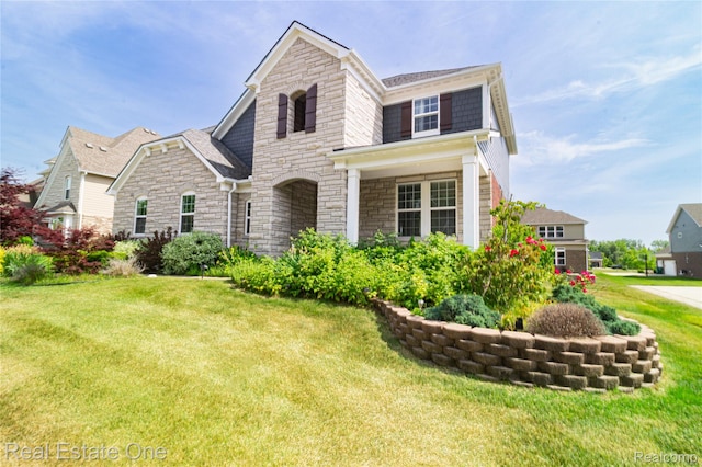 2959 Montgomery Cir, Walled Lake, MI 48390 - view of front of property featuring stone siding and a front yard