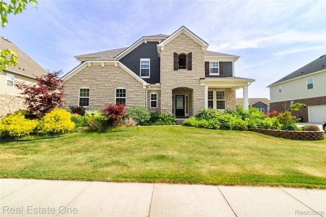 2959 Montgomery Cir, Walled Lake, MI 48390 - view of front facade with stone siding and a front yard