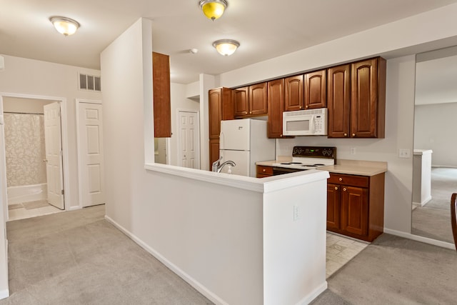 2105 Arcadia Dr, Canton, MI 48188 - kitchen with white appliances, light carpet, baseboards, and light countertops