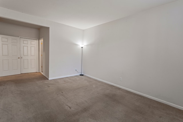 2105 Arcadia Dr, Canton, MI 48188 - unfurnished bedroom with baseboards, carpet, and a closet