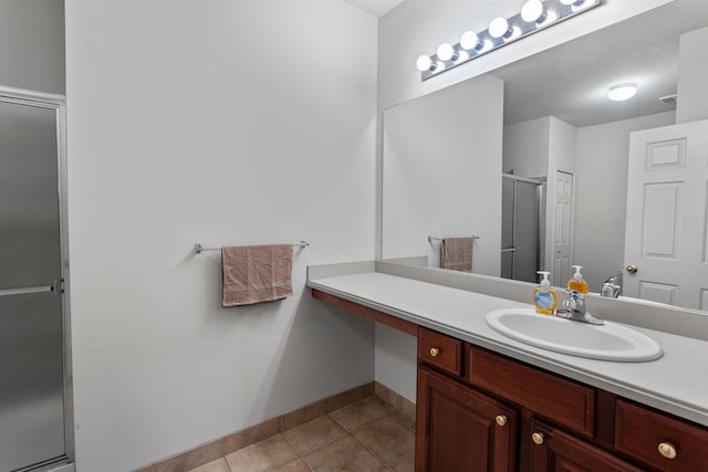 2105 Arcadia Dr, Canton, MI 48188 - full bath with a shower stall, tile patterned floors, vanity, and baseboards