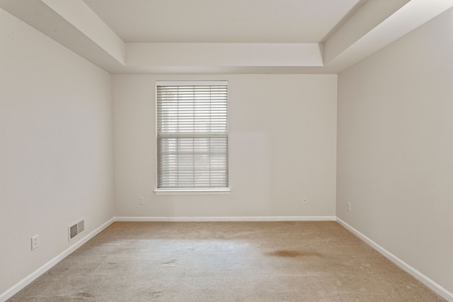 2105 Arcadia Dr, Canton, MI 48188 - carpeted empty room featuring a raised ceiling and baseboards