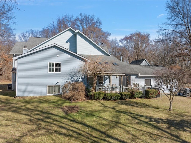 1270 John R Rd, Rochester Hills, MI 48307 - back of property with a yard and a wooden deck