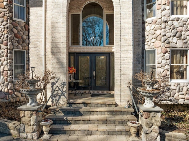 1270 John R Rd, Rochester Hills, MI 48307 - view of exterior entry with brick siding and french doors