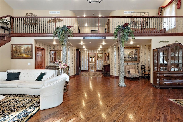 1270 John R Rd, Rochester Hills, MI 48307 - living area featuring visible vents, stairs, and wood finished floors
