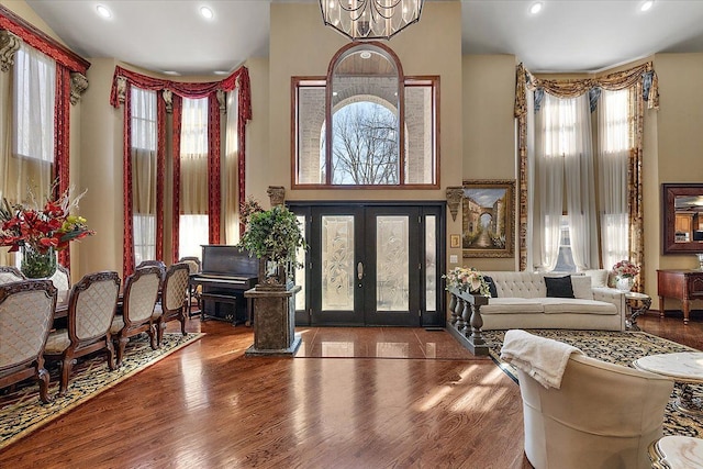 1270 John R Rd, Rochester Hills, MI 48307 - foyer entrance featuring wood finished floors, recessed lighting, french doors, a high ceiling, and a chandelier