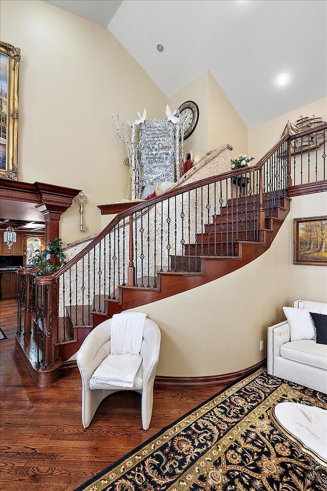 1270 John R Rd, Rochester Hills, MI 48307 - stairway featuring vaulted ceiling, recessed lighting, wood finished floors, and baseboards