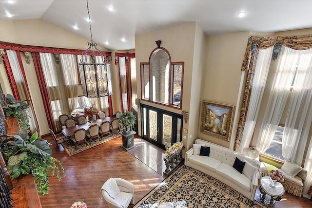 1270 John R Rd, Rochester Hills, MI 48307 - living room with a chandelier, lofted ceiling, and wood finished floors