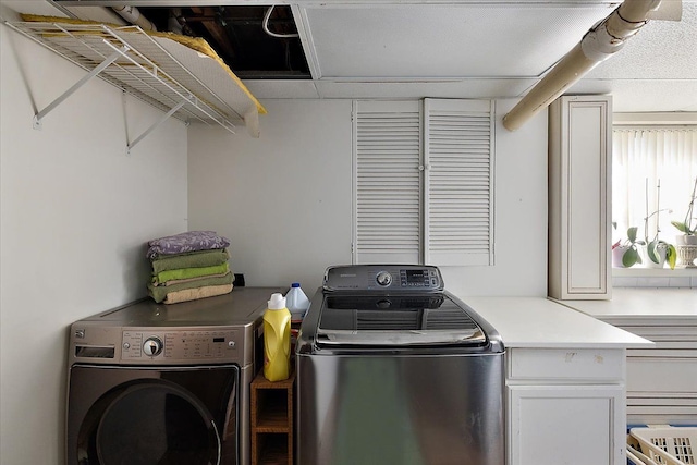 1270 John R Rd, Rochester Hills, MI 48307 - laundry area featuring cabinet space and separate washer and dryer