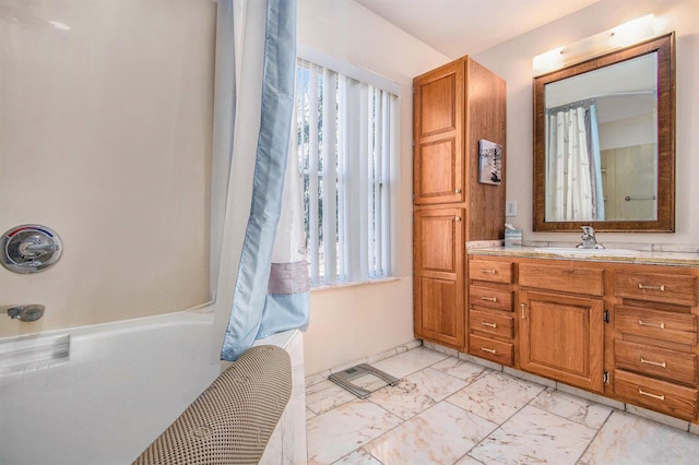 bathroom featuring shower / tub combo, marble finish floor, and vanity