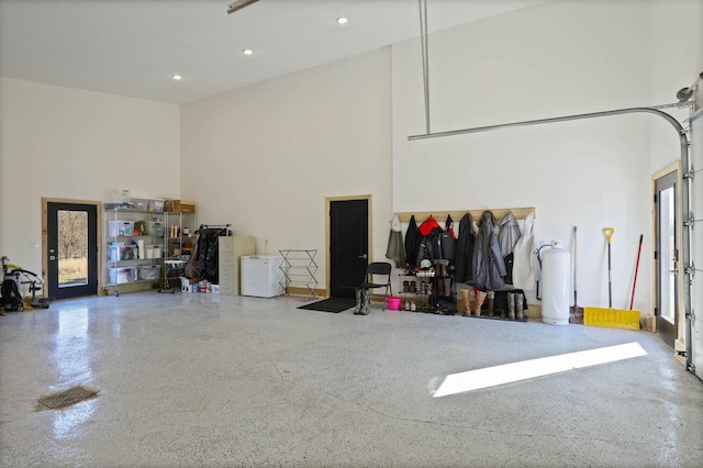5595 Riverview Dr, Bridgeport, MI 48722 - garage featuring recessed lighting