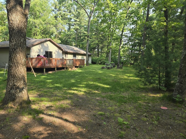 6560 Blue Lake Rd, Twin Lake, MI 49457 - view of grassy yard featuring a wooden deck