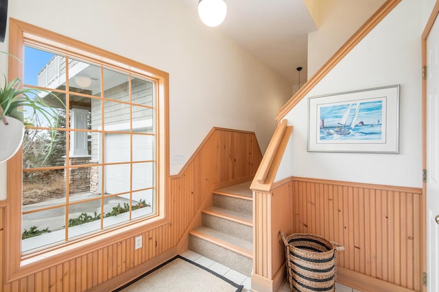 19148 Maiden Ln, Spring Lake, MI 49456 - stairway with wainscoting and wood walls