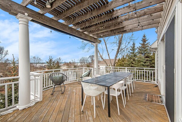 19148 Maiden Ln, Spring Lake, MI 49456 - deck featuring outdoor dining space and a pergola