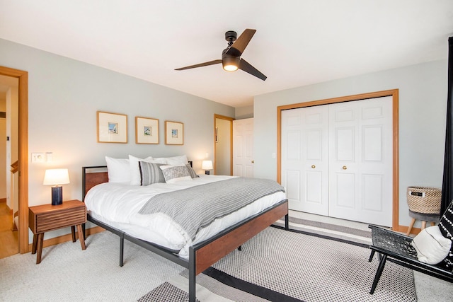 19148 Maiden Ln, Spring Lake, MI 49456 - bedroom featuring a closet, light colored carpet, and ceiling fan