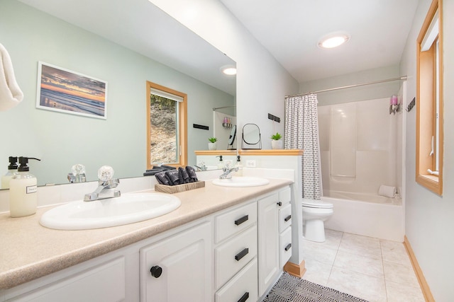 19148 Maiden Ln, Spring Lake, MI 49456 - bathroom featuring double vanity, shower / bath combination with curtain, and tile patterned flooring