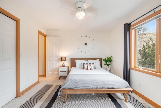 19148 Maiden Ln, Spring Lake, MI 49456 - bedroom with ceiling fan and light colored carpet