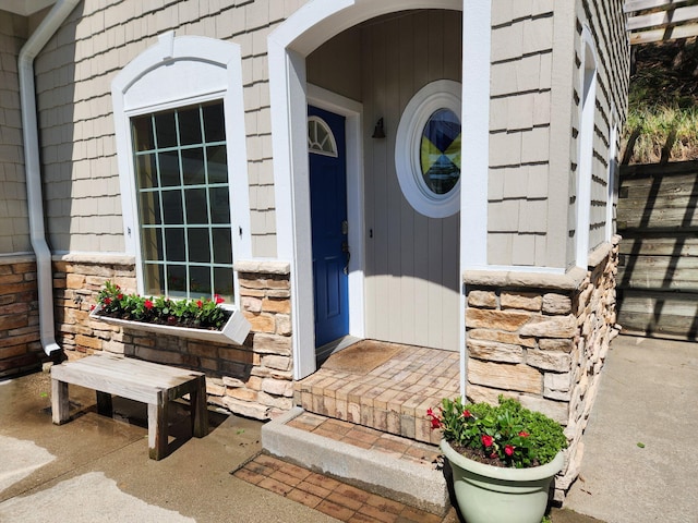 19148 Maiden Ln, Spring Lake, MI 49456 - view of exterior entry with stone siding