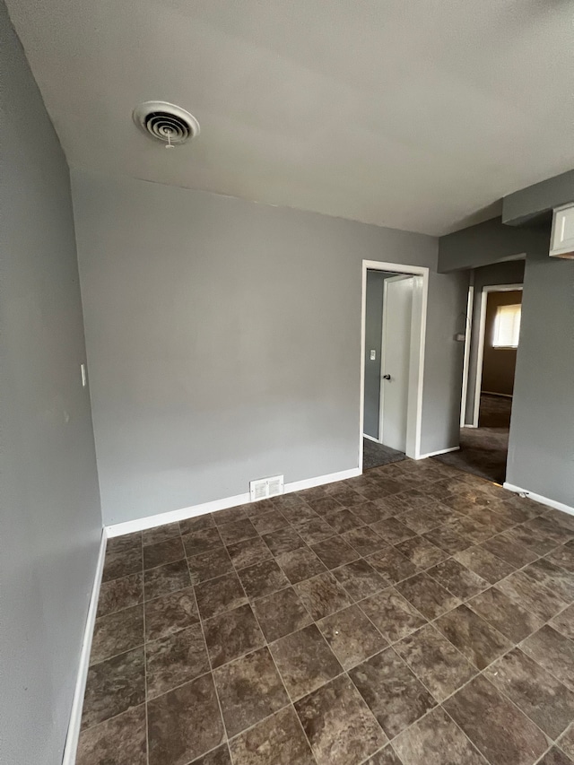 13900 Sussex St, Detroit, MI 48227 - empty room featuring visible vents and baseboards