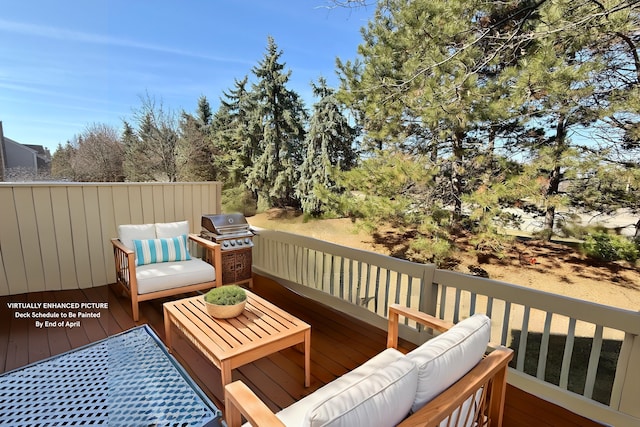 wooden terrace with grilling area and an outdoor living space