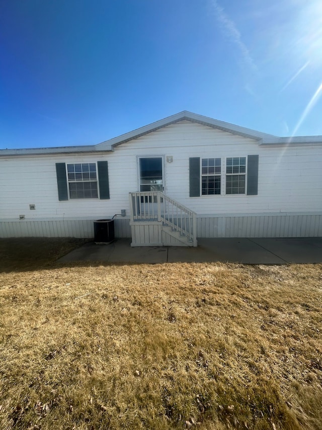 manufactured / mobile home featuring central AC unit