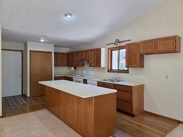 3380 Watersedge Dr, Brighton, MI 48114 - kitchen featuring white range with electric stovetop, a sink, a textured ceiling, brown cabinets, and light countertops
