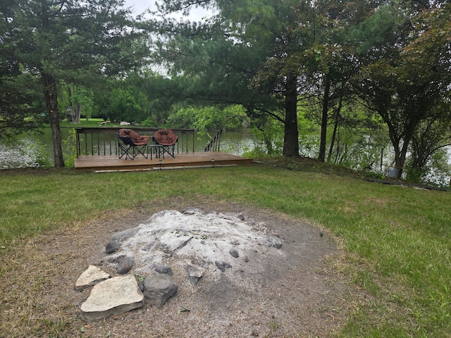 3380 Watersedge Dr, Brighton, MI 48114 - view of grassy yard featuring a deck
