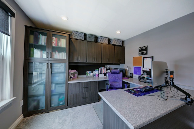 office with recessed lighting and baseboards