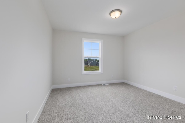 343 Seneca Ridge Dr Unit 40, Middleville, MI 49333 - unfurnished room featuring carpet and baseboards
