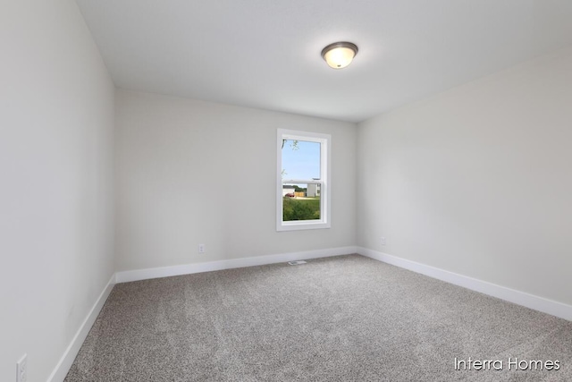 343 Seneca Ridge Dr Unit 40, Middleville, MI 49333 - carpeted empty room featuring baseboards