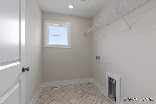 343 Seneca Ridge Dr Unit 40, Middleville, MI 49333 - laundry area featuring washer hookup and recessed lighting