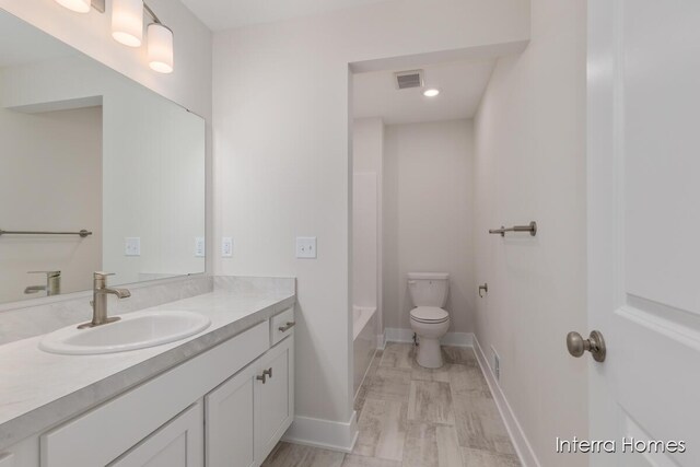 343 Seneca Ridge Dr Unit 40, Middleville, MI 49333 - bathroom featuring vanity, bathing tub / shower combination, and recessed lighting
