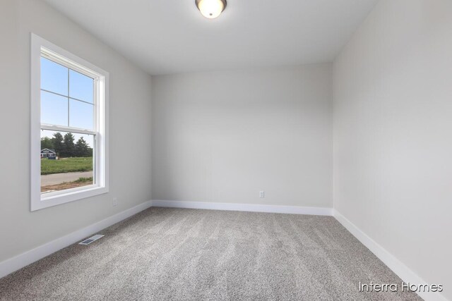 343 Seneca Ridge Dr Unit 40, Middleville, MI 49333 - empty room with carpet
