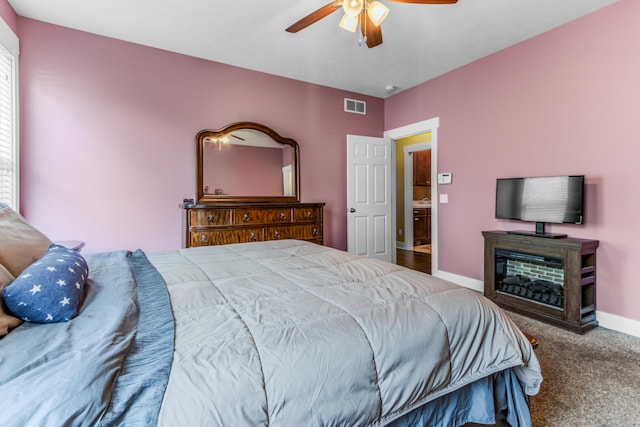 3269 Hopewell Ct NE, Rockford, MI 49341 - bedroom with carpet, baseboards, and a ceiling fan