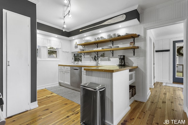 1200 Beach Dr, Holland, MI 49423 - kitchen with dishwasher, ornamental molding, light wood-style flooring, open shelves, and white microwave