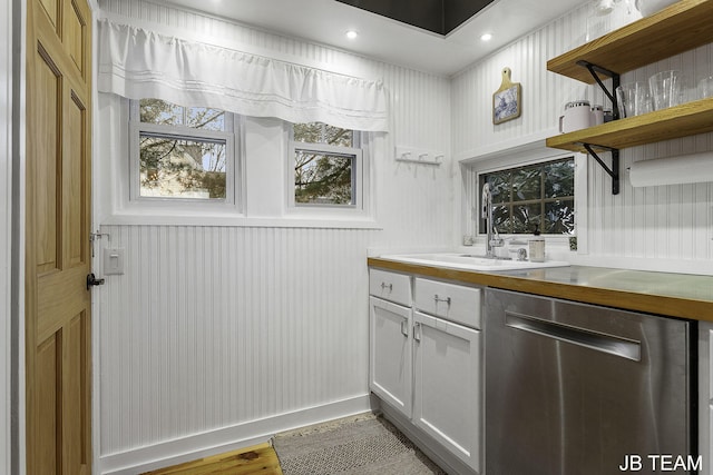 1200 Beach Dr, Holland, MI 49423 - bar with dishwasher, a sink, wood finished floors, and baseboards