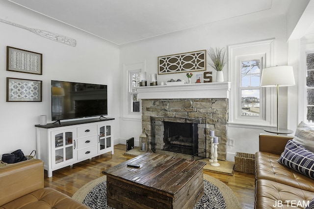 1200 Beach Dr, Holland, MI 49423 - living area featuring wood finished floors and a fireplace