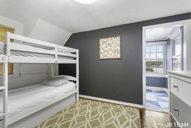 1200 Beach Dr, Holland, MI 49423 - bedroom featuring wood finished floors and baseboards