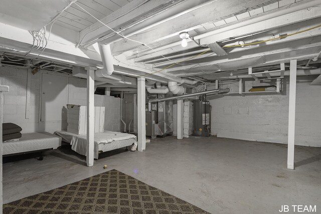 1200 Beach Dr, Holland, MI 49423 - unfinished below grade area with gas water heater and heating unit
