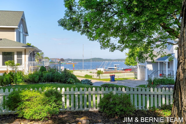 1200 Beach Dr, Holland, MI 49423 - fenced yard featuring a water view