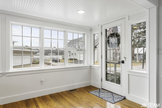 1200 Beach Dr, Holland, MI 49423 - unfurnished sunroom with plenty of natural light