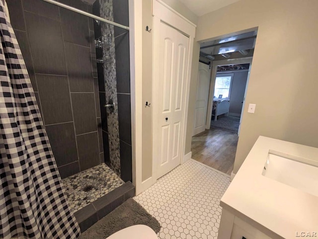 13936 Allen Rd, Clinton, MI 49236 - bathroom featuring tiled shower and vanity