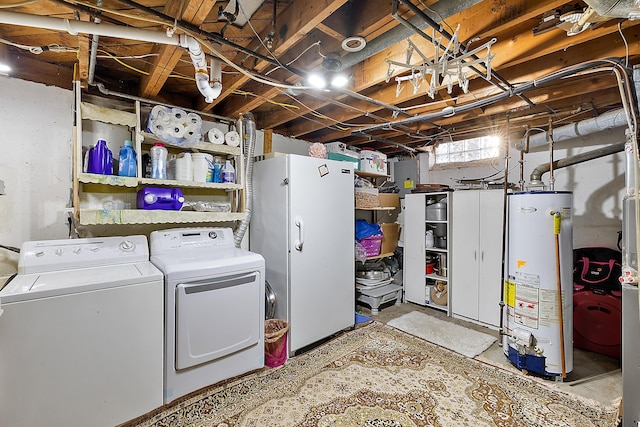 below grade area with washer and dryer, water heater, and freestanding refrigerator