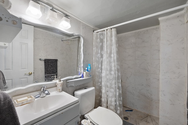 bathroom featuring tiled shower, toilet, tile walls, and vanity