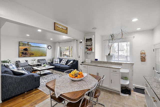living area featuring recessed lighting