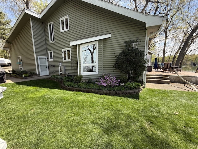 47463 Lakeview Dr, Lawrence, MI 49064 - view of front of property with a front lawn and a patio area