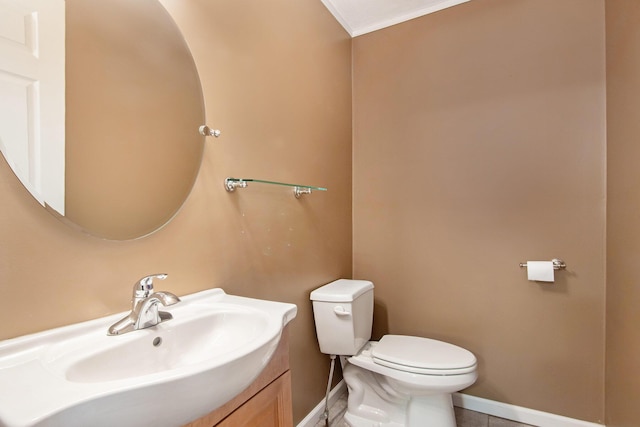 47463 Lakeview Dr, Lawrence, MI 49064 - half bathroom with toilet, baseboards, vanity, crown molding, and tile patterned flooring